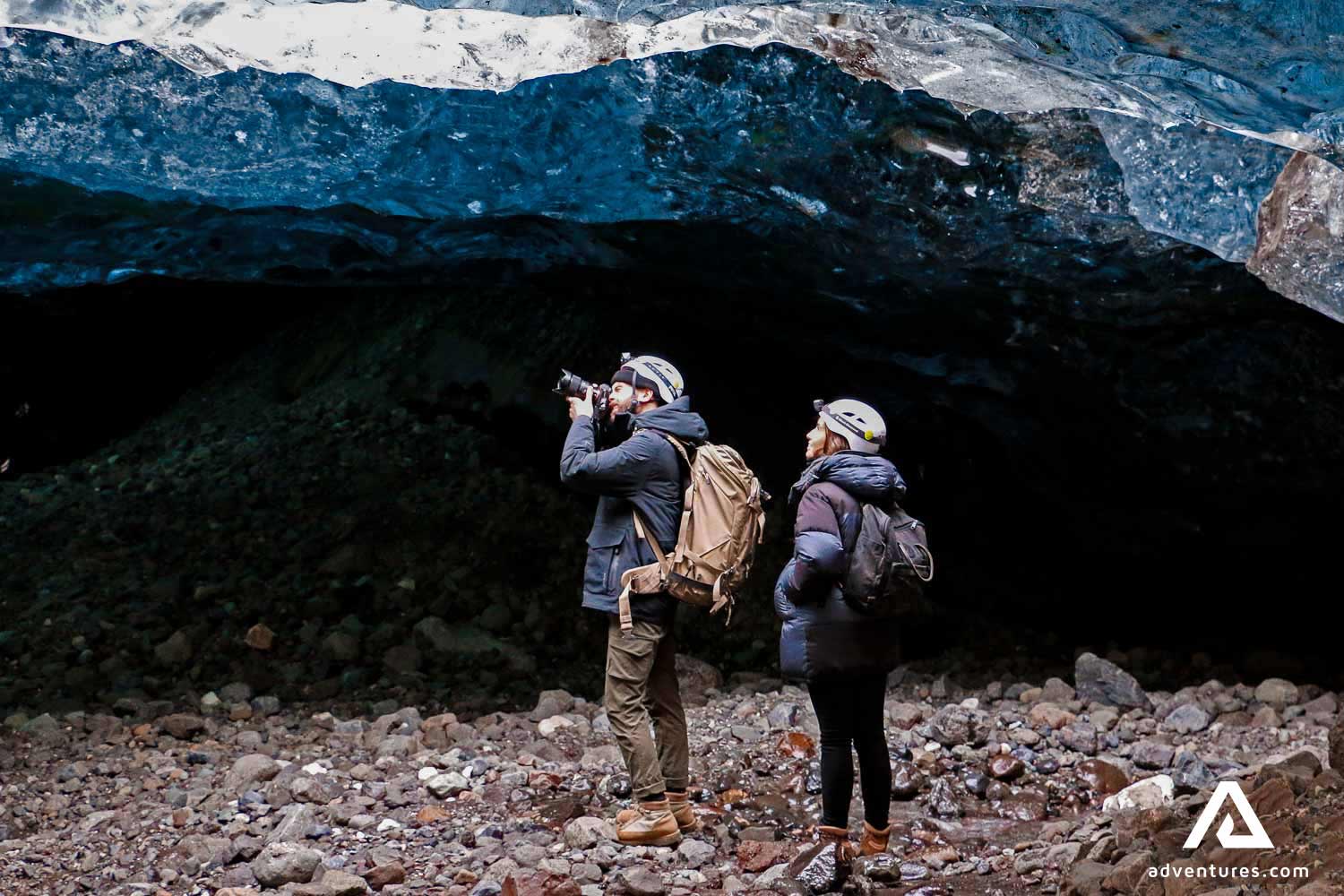 Photographer in Icelandic Ice Cave