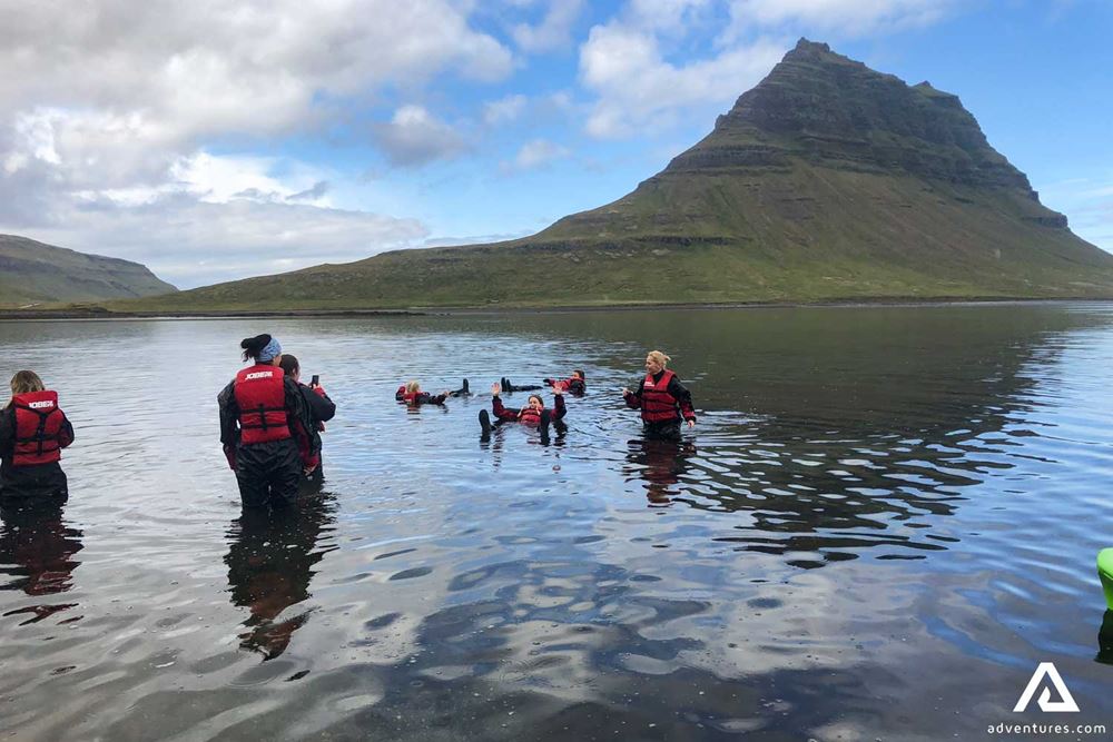 Group Swimming by Kirkjufell