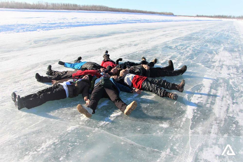 Group Laying on Ice