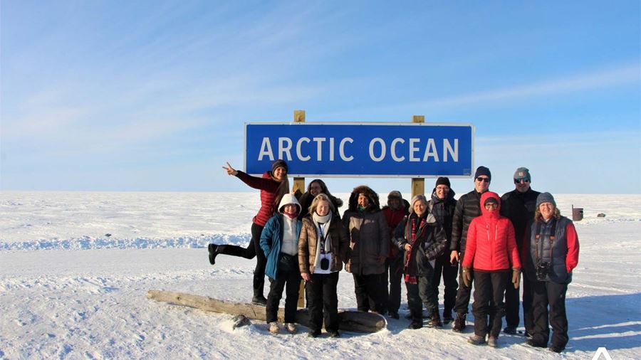 Group Posing by Arctic Ocean