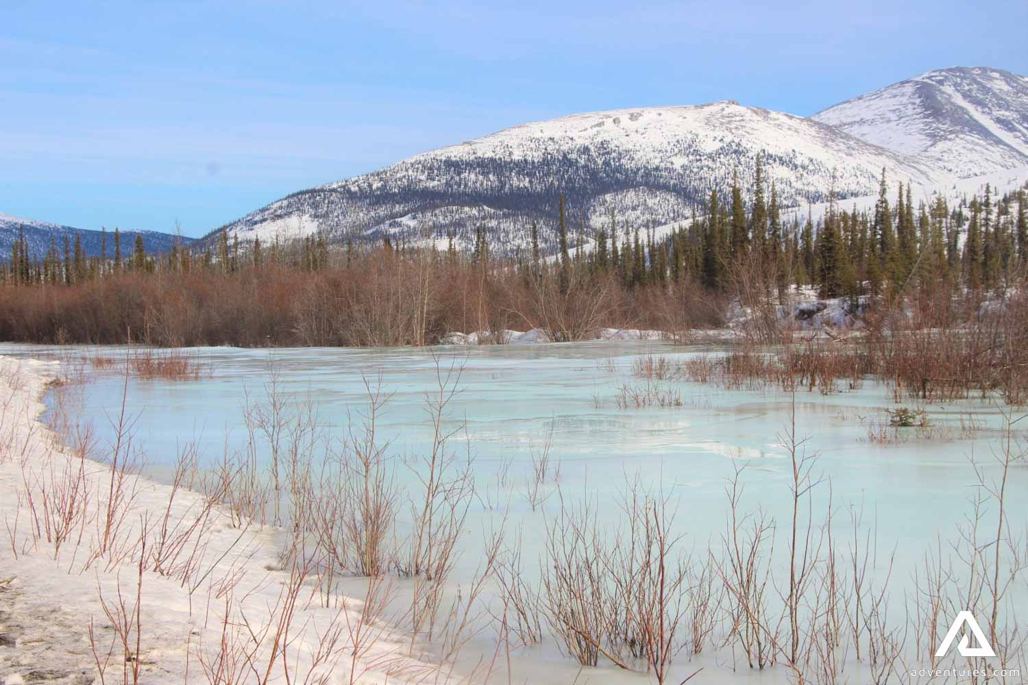 Frozen Lake by Dempster Highway in Canada