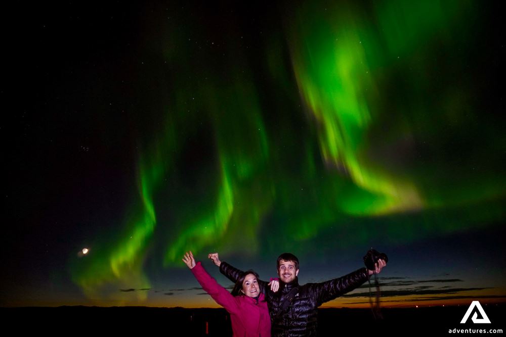 Excited Couple Watching Auroras