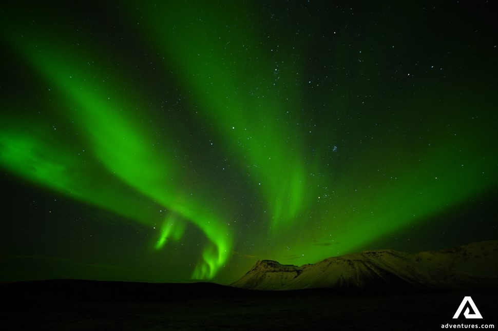 Aurora Borealis over the Mountains in Iceland