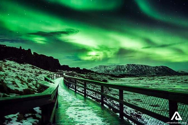 Bright Auroras in Iceland by the Mountains