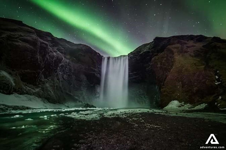 Aurora over Skogafoss Waterfall in South Iceland