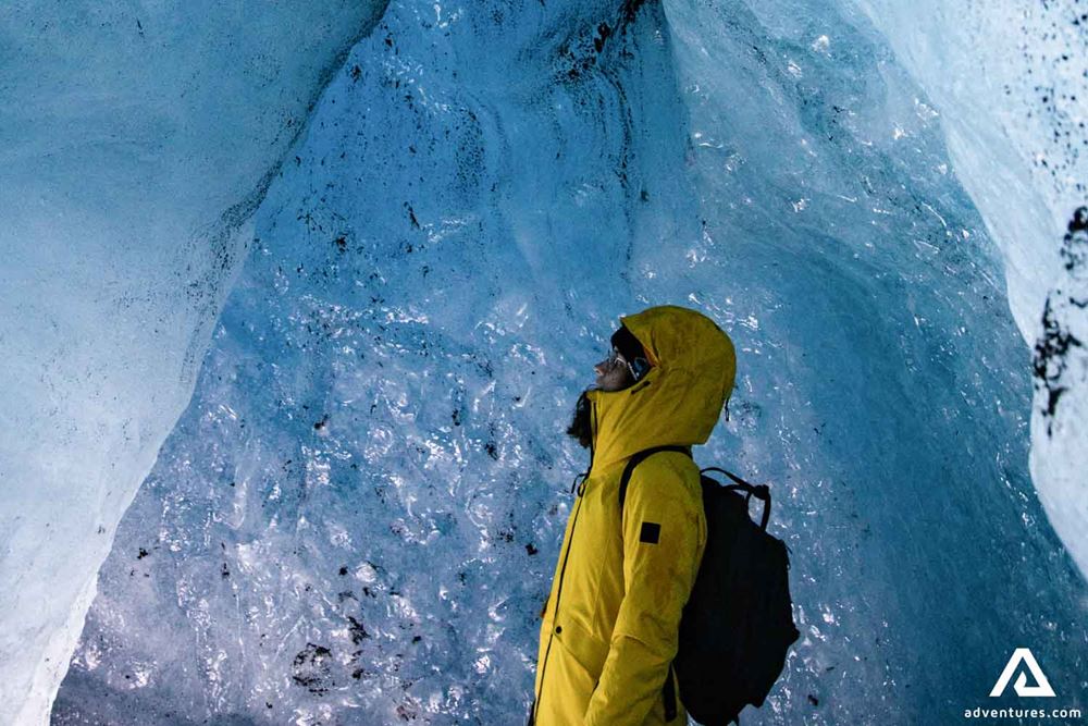 Woman with Yellow Jacket at Ice Cave