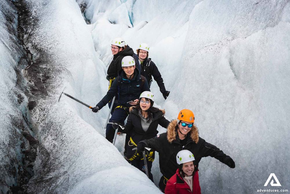 Tour Group Hiking in Ice Crevasse