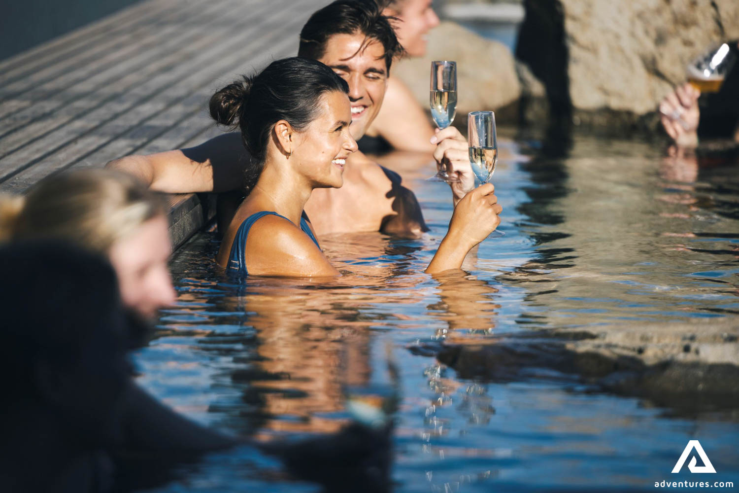 Happy People Bathing in Hot Springs