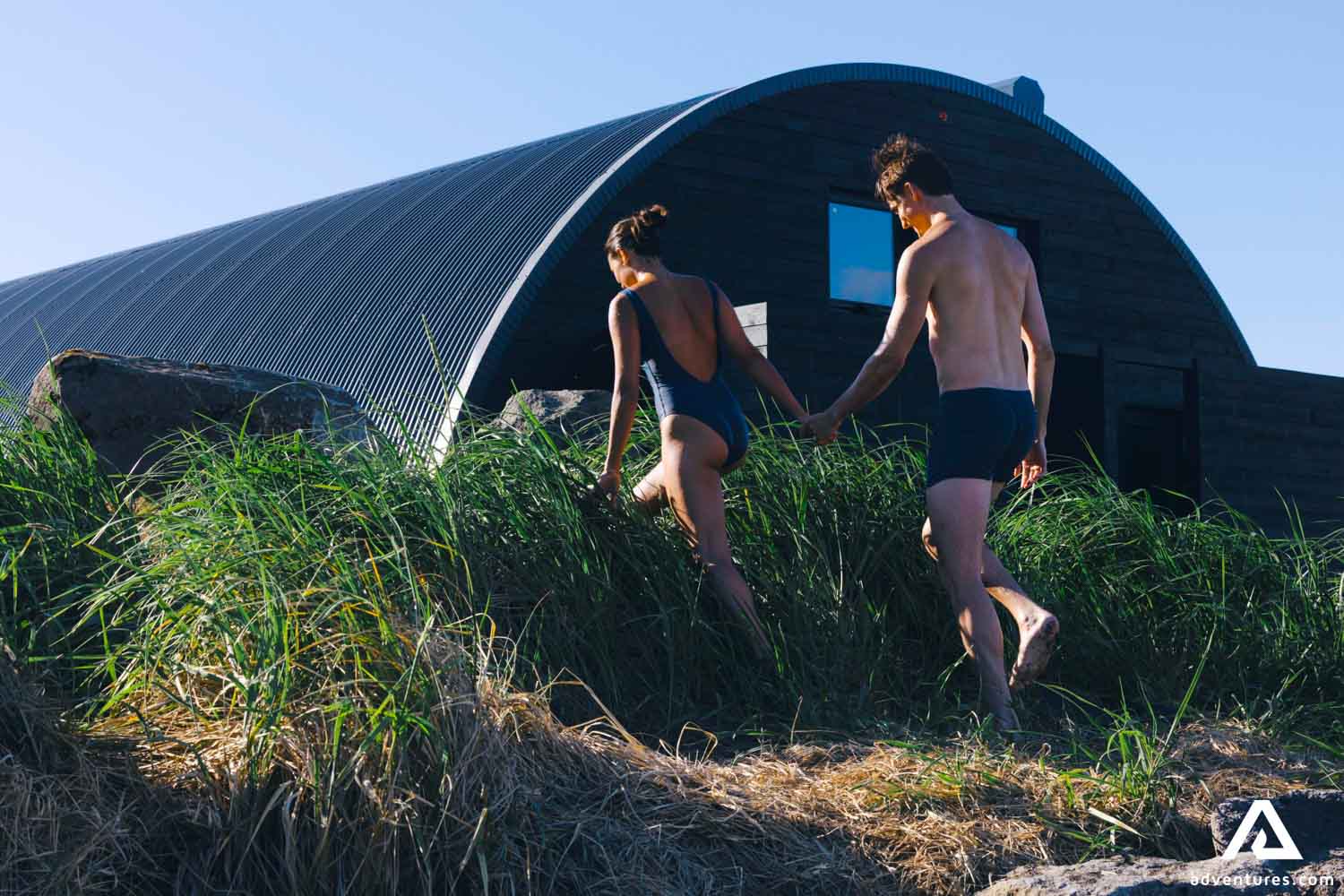 Couple Walking in Bathing Suits