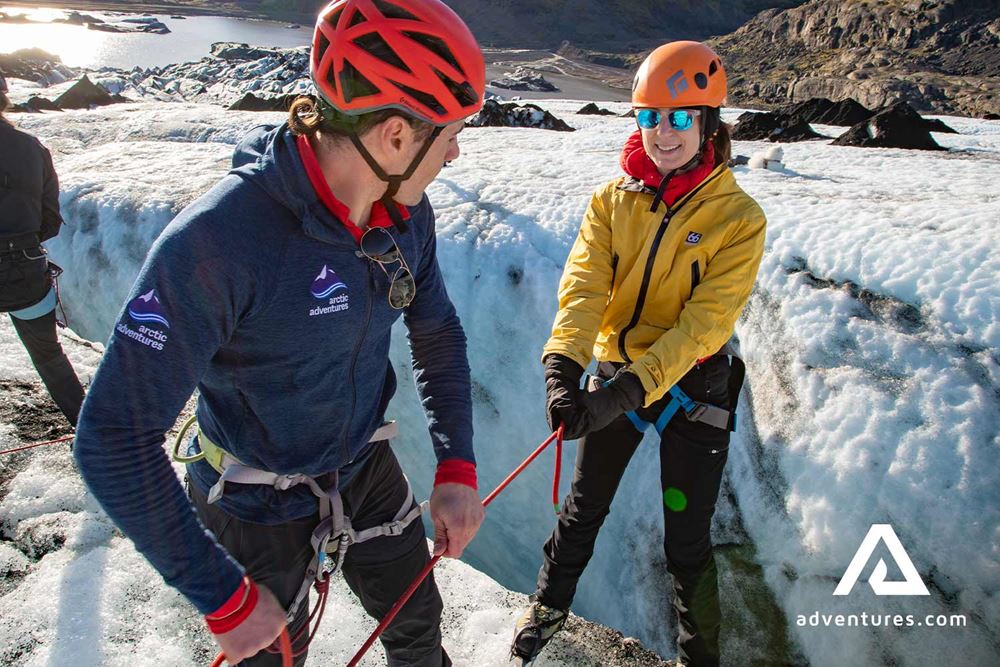 Glacier Guide Helping for Woman