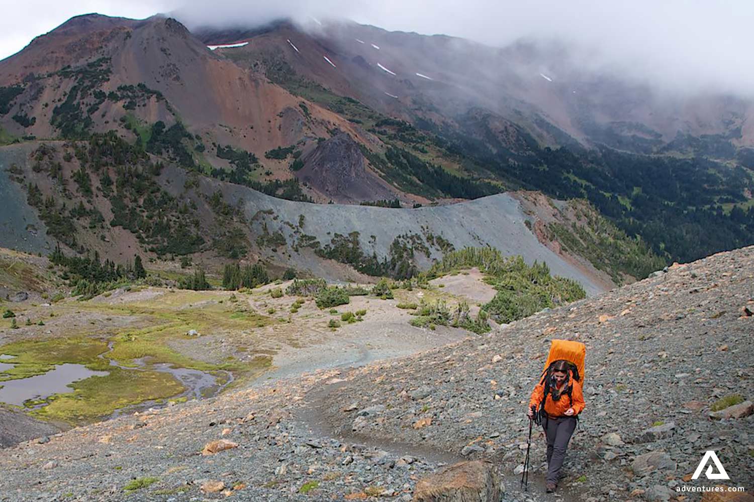 Woman Climbing into Chilcotin Mountain