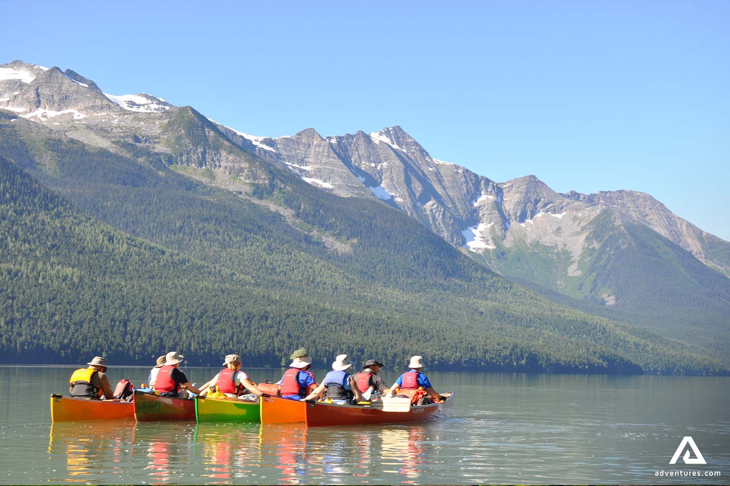 Canoeing by Cariboo Mountains in Bowron Lakes