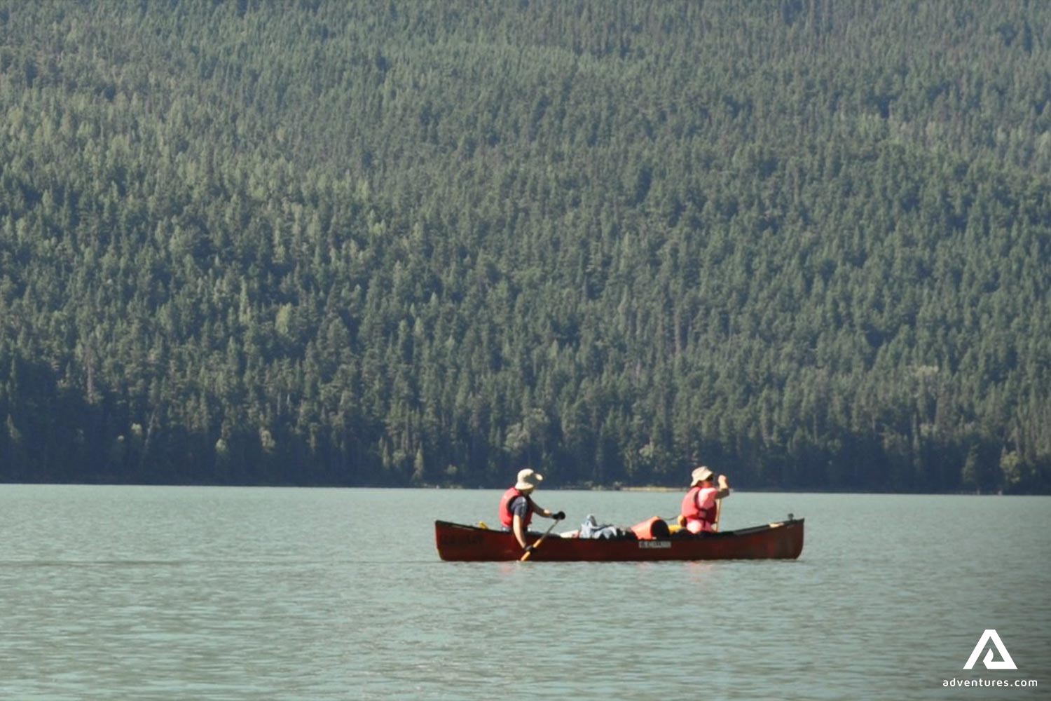 Two People Canoeing at Bowron Lakes