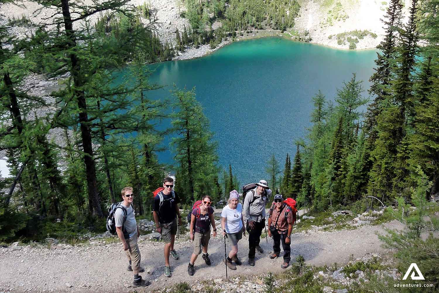Group by Blue Lake in Rocky Mountains