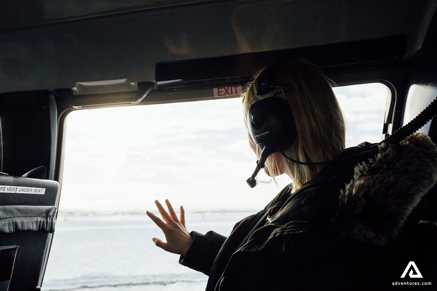 Woman Looking through Helicopter Window
