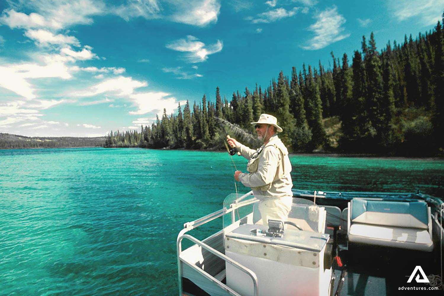 Man Boat Fishing in Blue Waters of Coghlan Lake