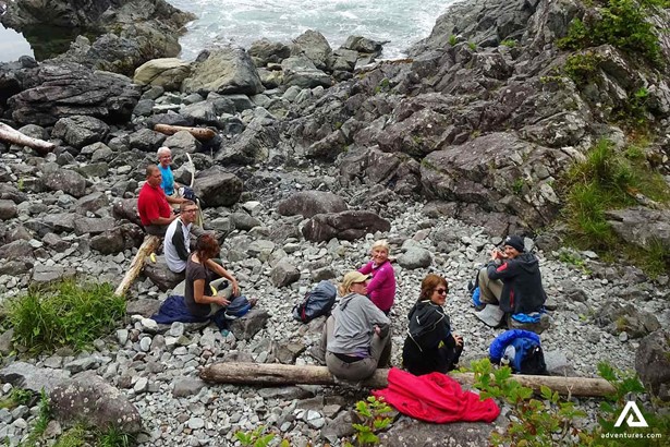 Group of People Resting by the Seashore in Vancouver Island