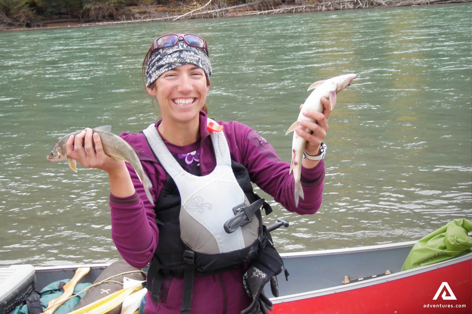 Happy Woman Caught Two Fishes