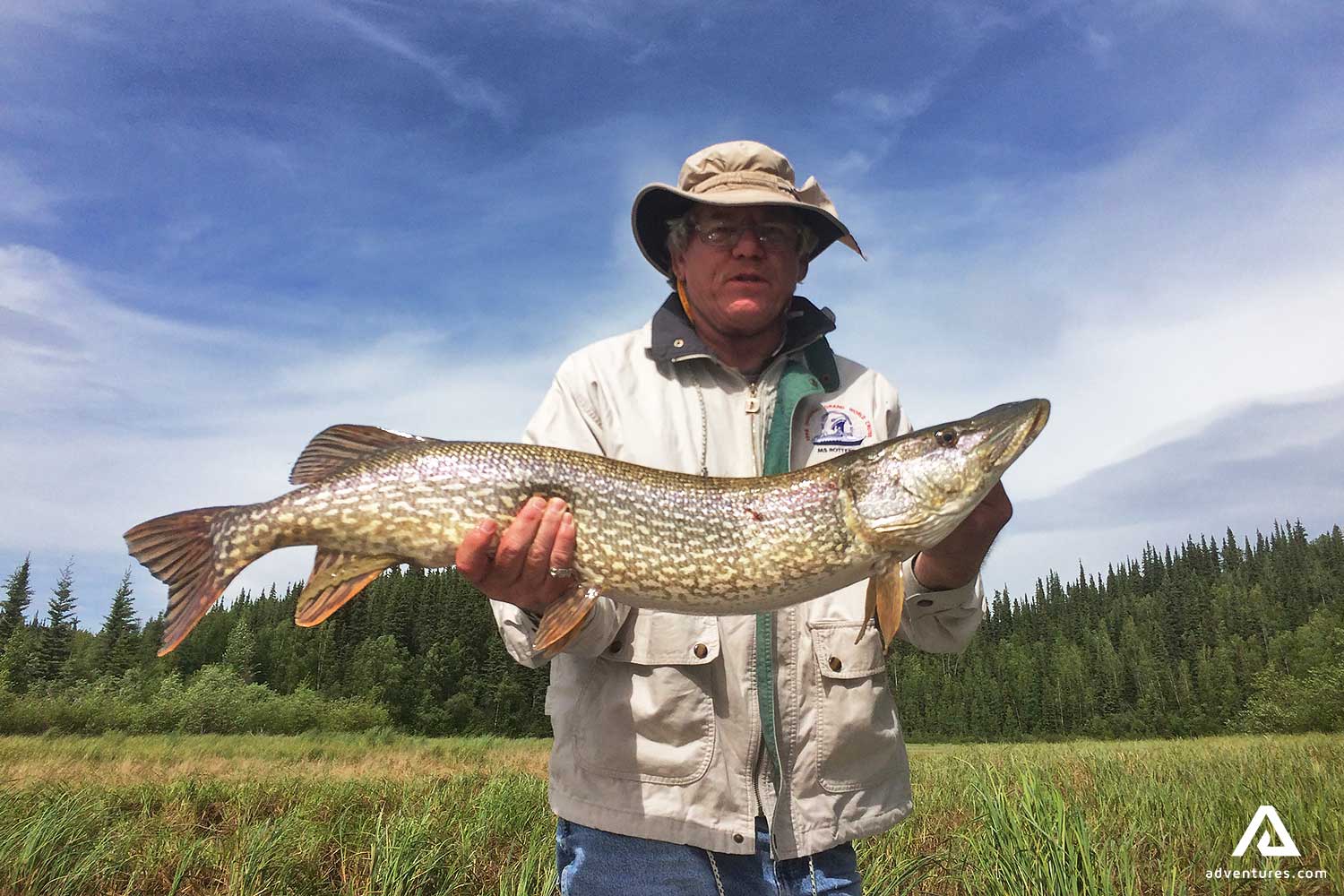 Man Showing Trout he Caught
