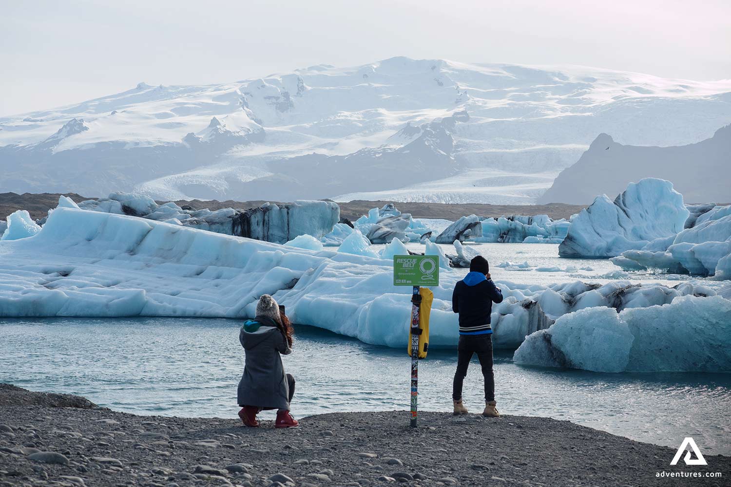 People Taking Pictures of Icebergs in Glacier Lagoon