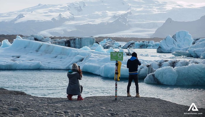 People Taking Pictures of Icebergs in Glacier Lagoon
