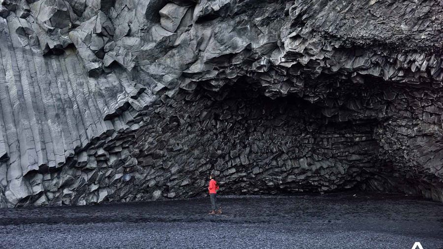 Woman in Basalt Columns Cave