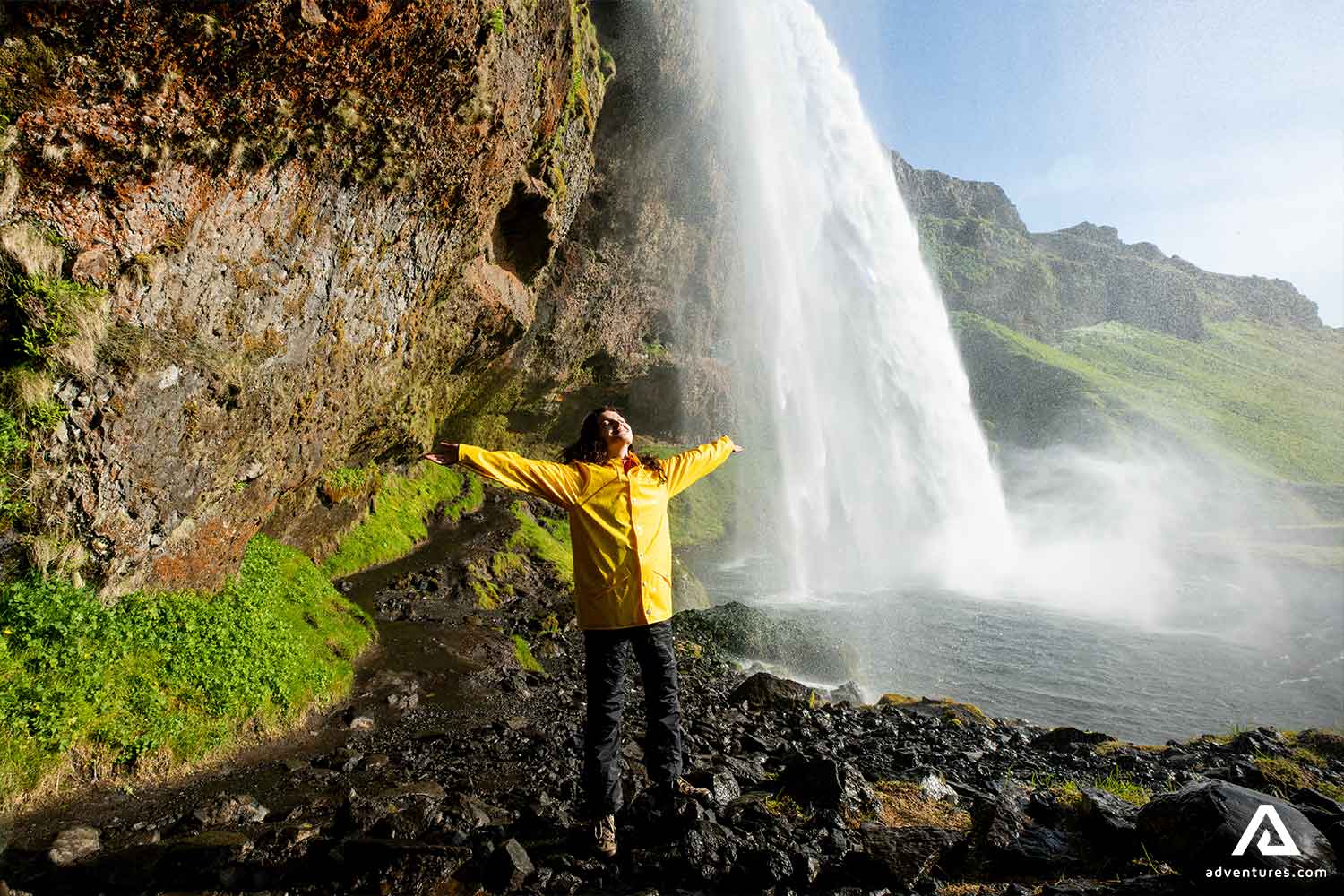 Woman Enjoys Waterfall