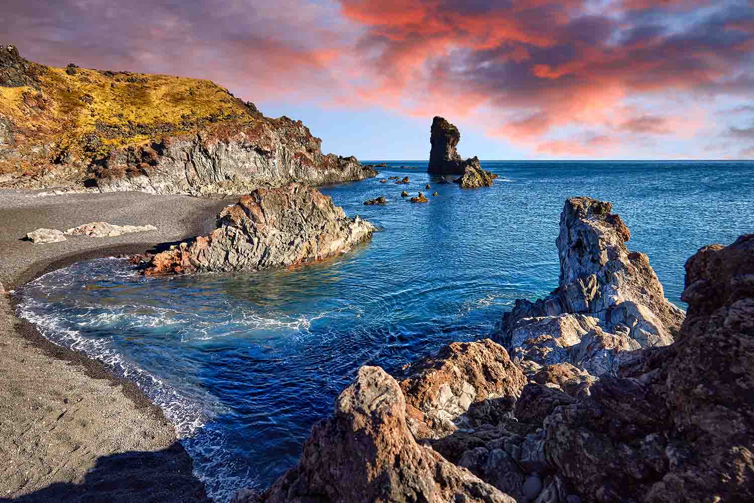 Panoramic view at Djupalonssandur bay in Snaefellsnes peninsula in Western Iceland