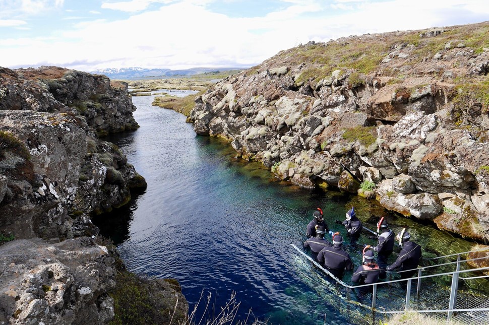  Scuba diving at Silfra rift, where Eurasian and American tectonic plate are divided