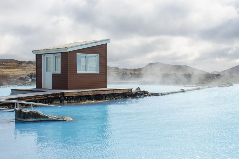Steam rising above the milky blue waters at the Mývatn Nature Baths