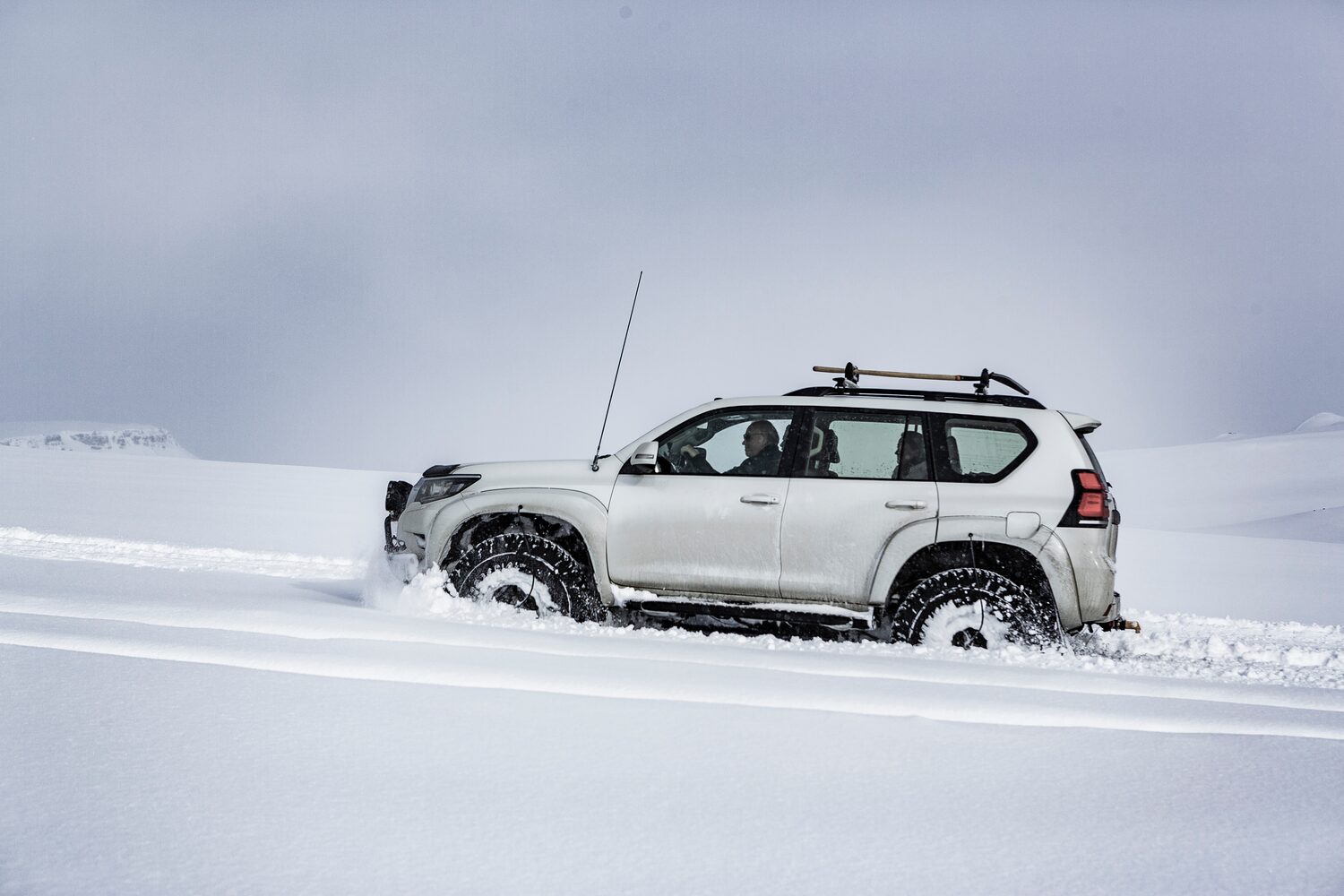 Super jeep drives up the glacier