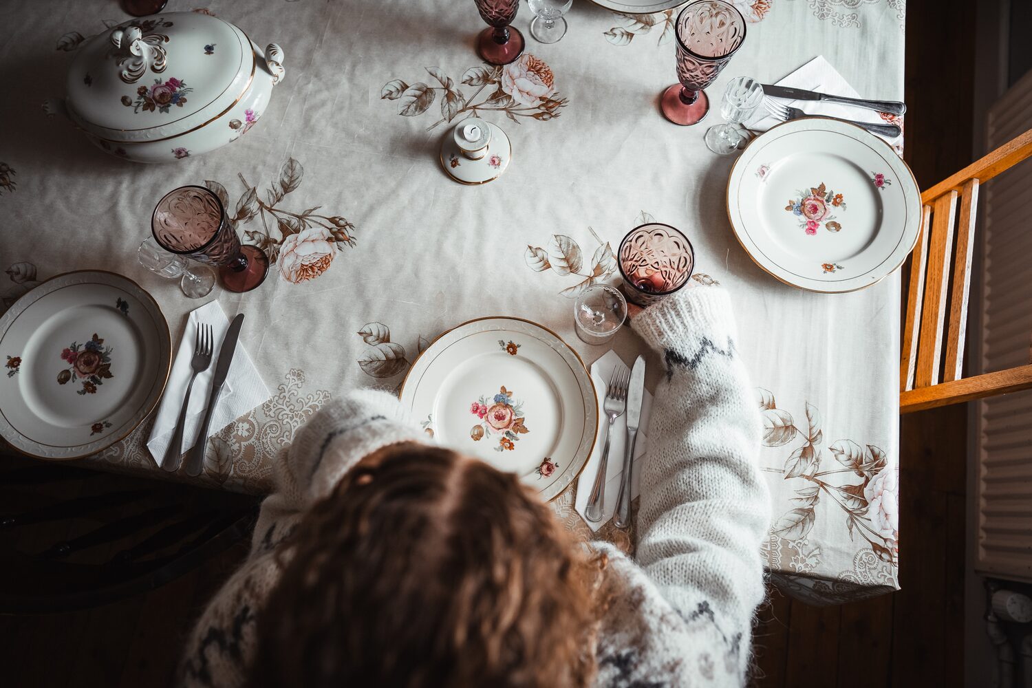 Woman by the dinner table