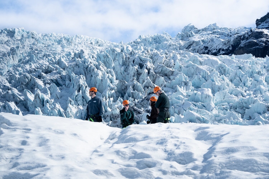 People enjoying on Vatnajokull glacier in Iceland