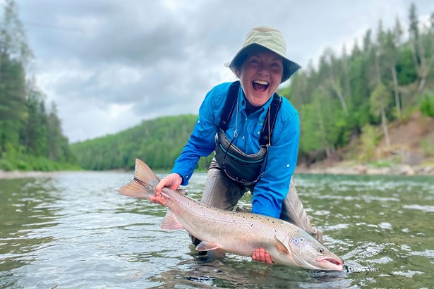 Woman caught a fish in Canadian river