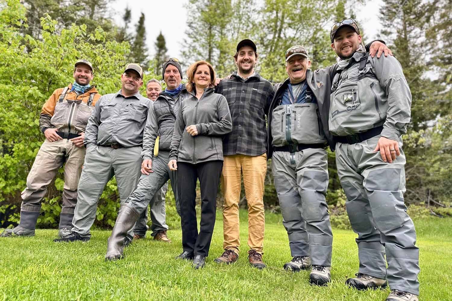 Group of people posing for photo