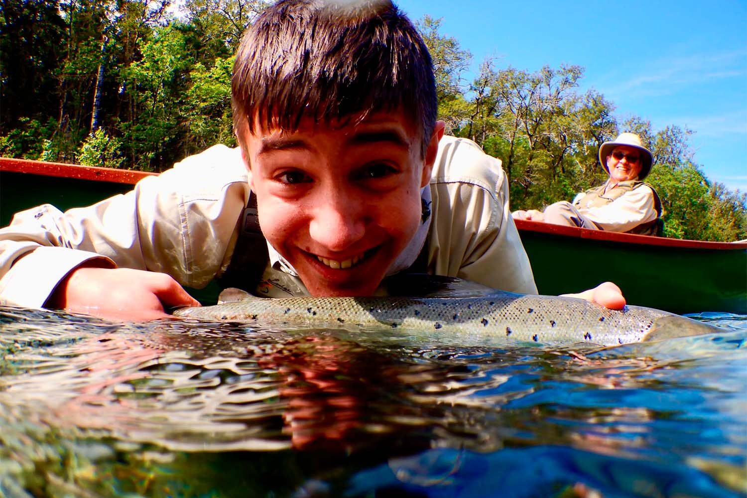 Boy caught fish in Cascapedia river