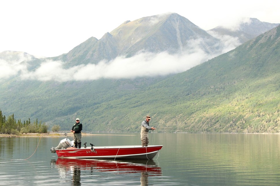 Two man fishing in boat at Canadian lake