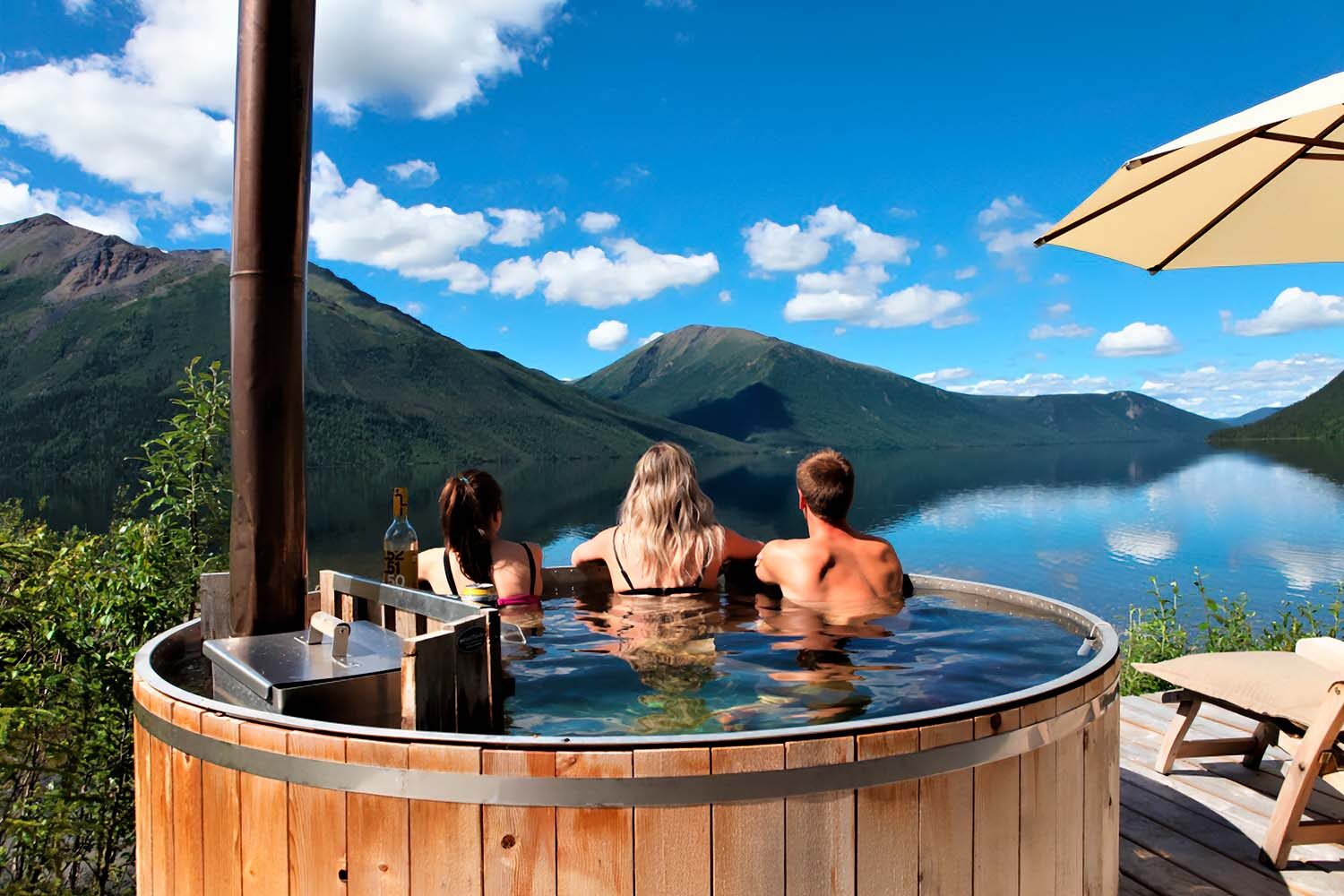 Three people in hot tub by Tincup lake