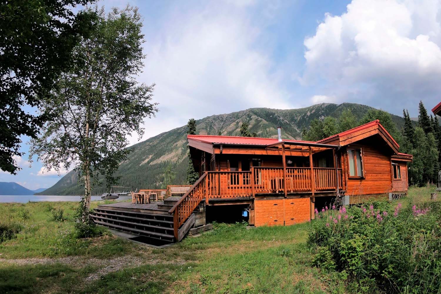 Wooden wilderness lodge by Tincup lake in Canada