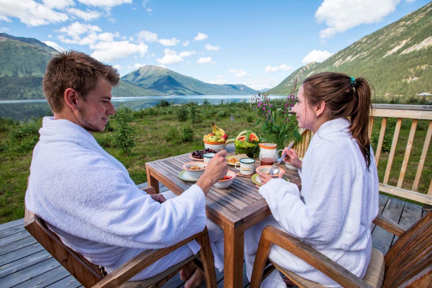 Couple having breakfast by Tincup lake