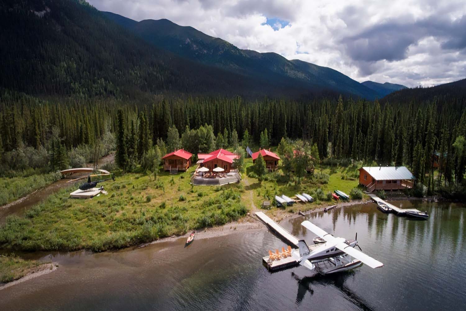 Wilderness lodges with boats and plane in Yukon from above