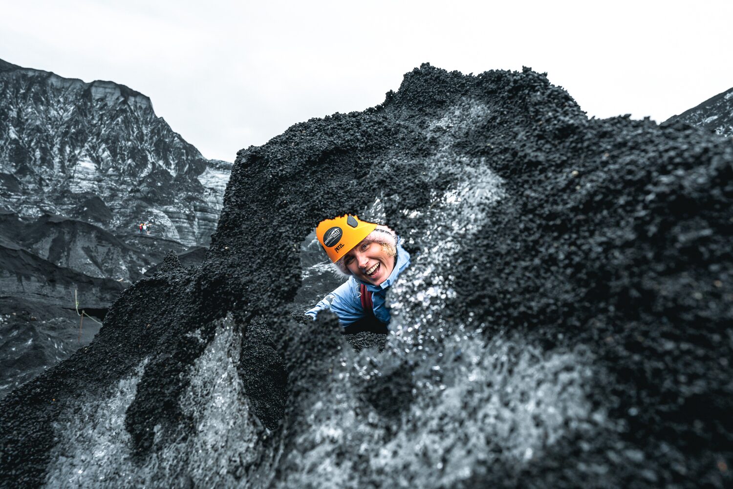 Tourist Posing Ice Formation