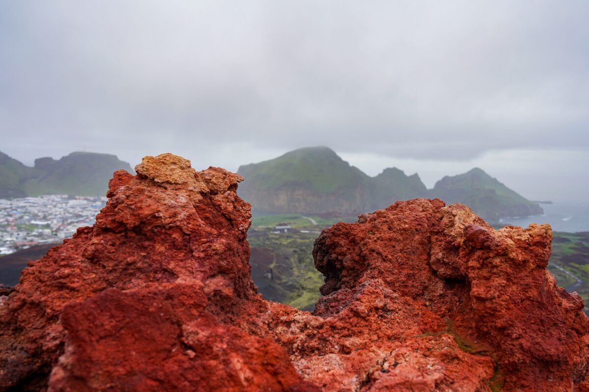 Red lava fields in Vestmannaeyjar islands