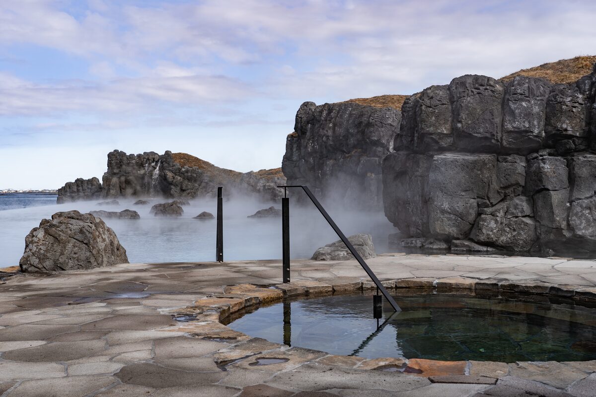 Steamy lagoon and cold pool by rocks