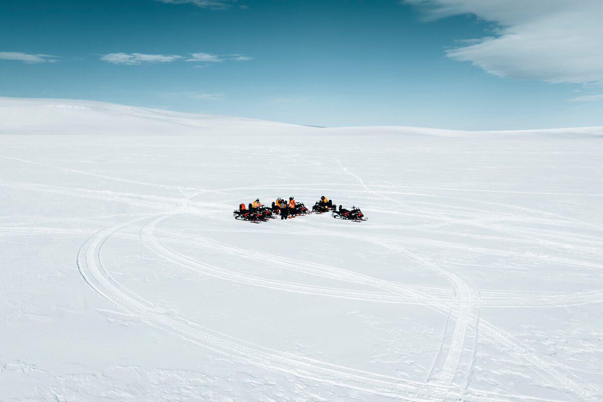 Tour Of Snowmobiling Happening On A langjokull Glacier
