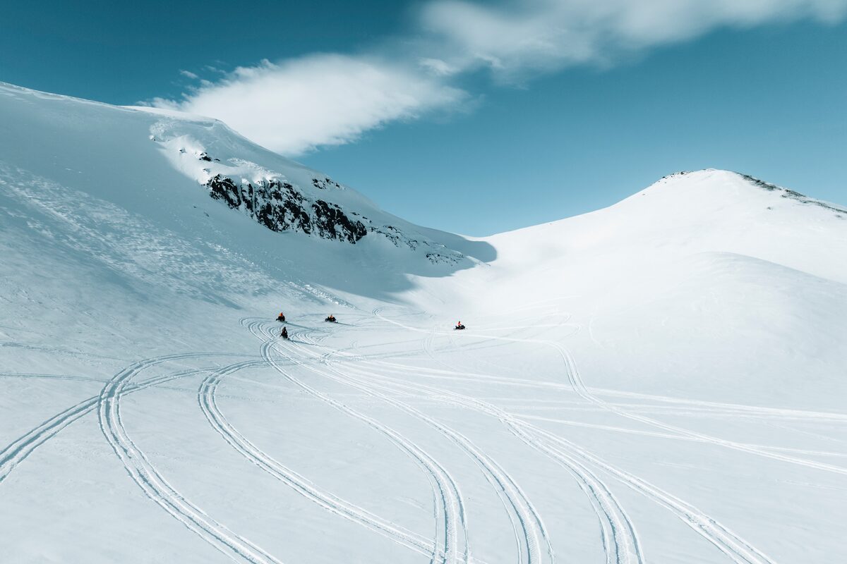 Wide Picture Of Snowmobiling Tour On Langjokull Glacier