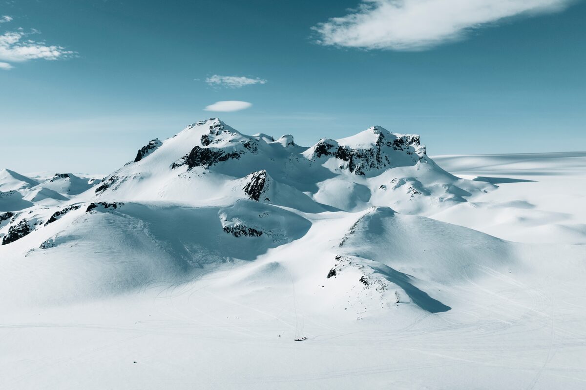 Langjokull Glacier From Afar With Snowmobiles in iceland