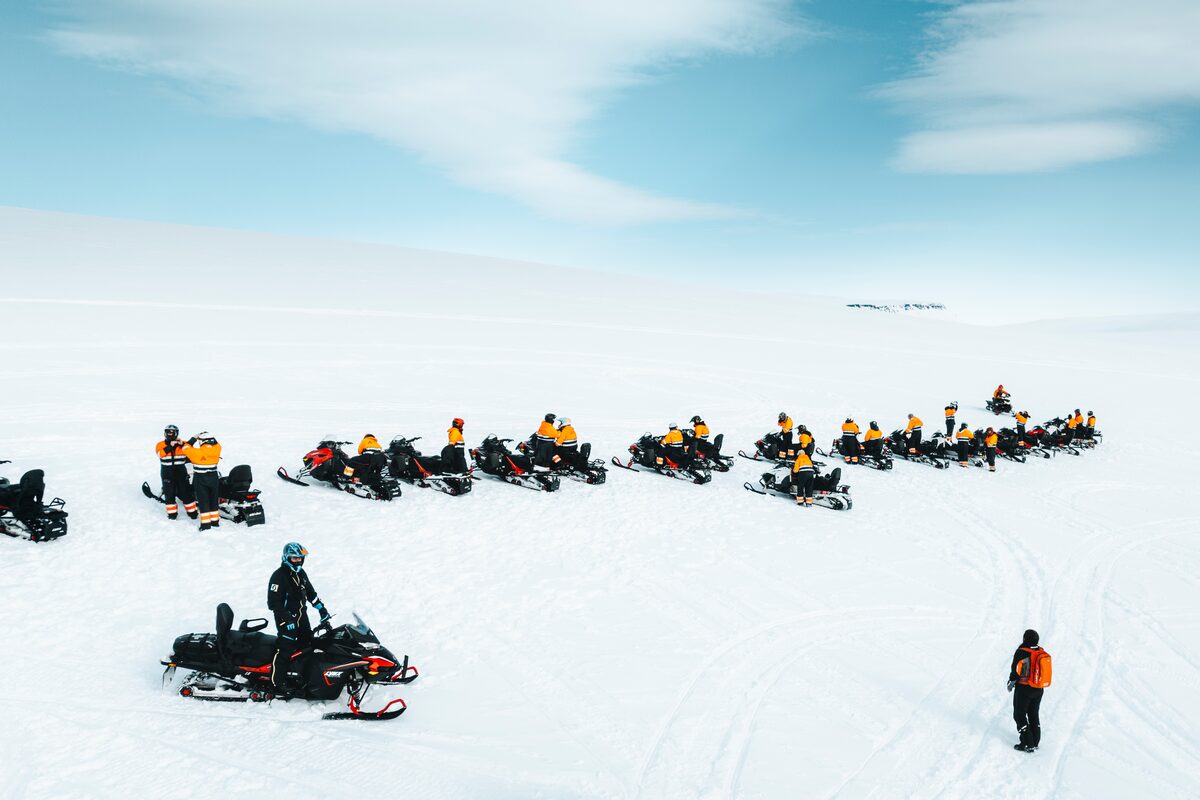 People Preparing For A Snowmobiling Tour On Langjokull Glacier
