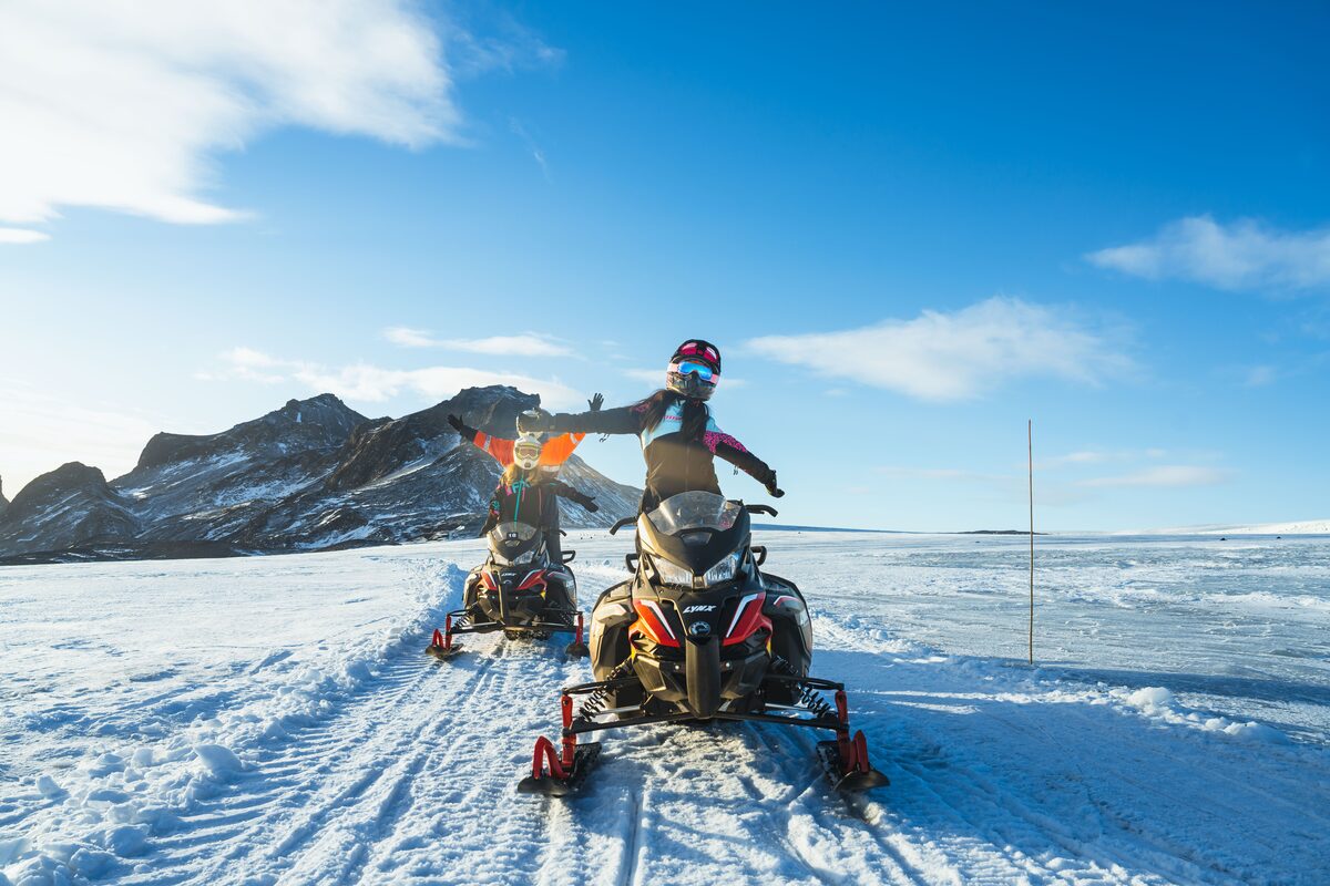 A Pair Of Snowmobiles On A Tour of snowmobiling In Iceland
