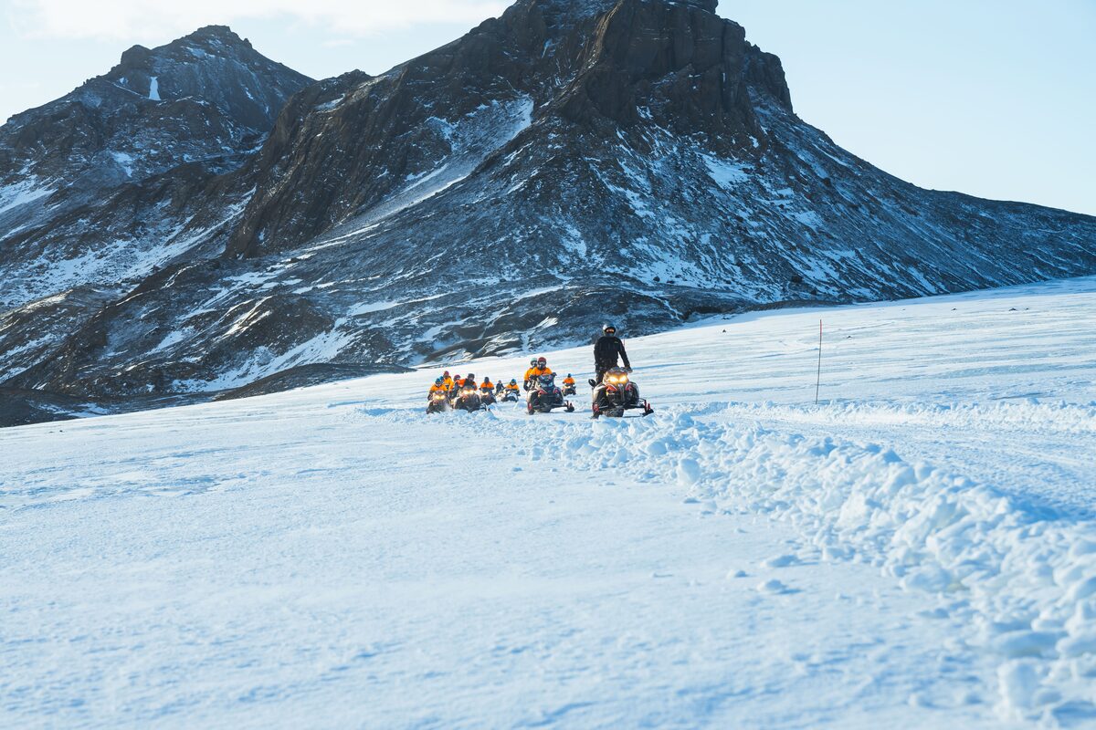 Snowmobiling Tour In Progress On Langjokull Glacier in iceland